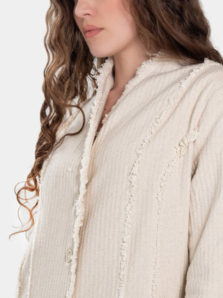 a model wearing a Spliced-Raw-Edge-Long-Jacket-close-view by baci fashion