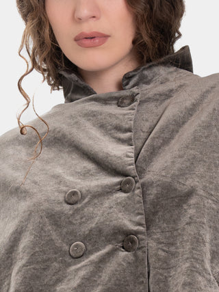 close up of a models chest to show the details of the velvet fabric 