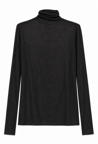 a cashmere sweater flat lay against a white background