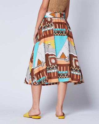 A maxi skirt with a belted waistband, featuring a geometric Aztec pattern in multicolor.